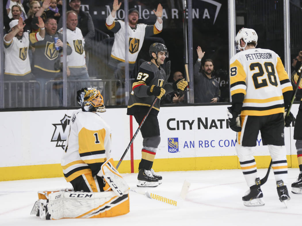 Golden Knights left wing Max Pacioretty (67) celebrates his goal against Pittsburgh Penguins goaltender Casey DeSmith (1) during the first period of an NHL hockey game at T-Mobile Arena in Las Veg ...