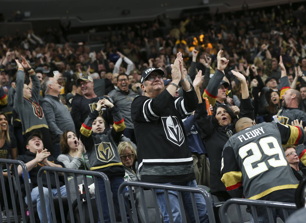 Golden Knights fans celebrate a goal by Golden Knights center Jonathan Marchessault during the second period of an NHL hockey game at T-Mobile Arena in Las Vegas on Saturday, Jan. 19, 2019. Chase ...