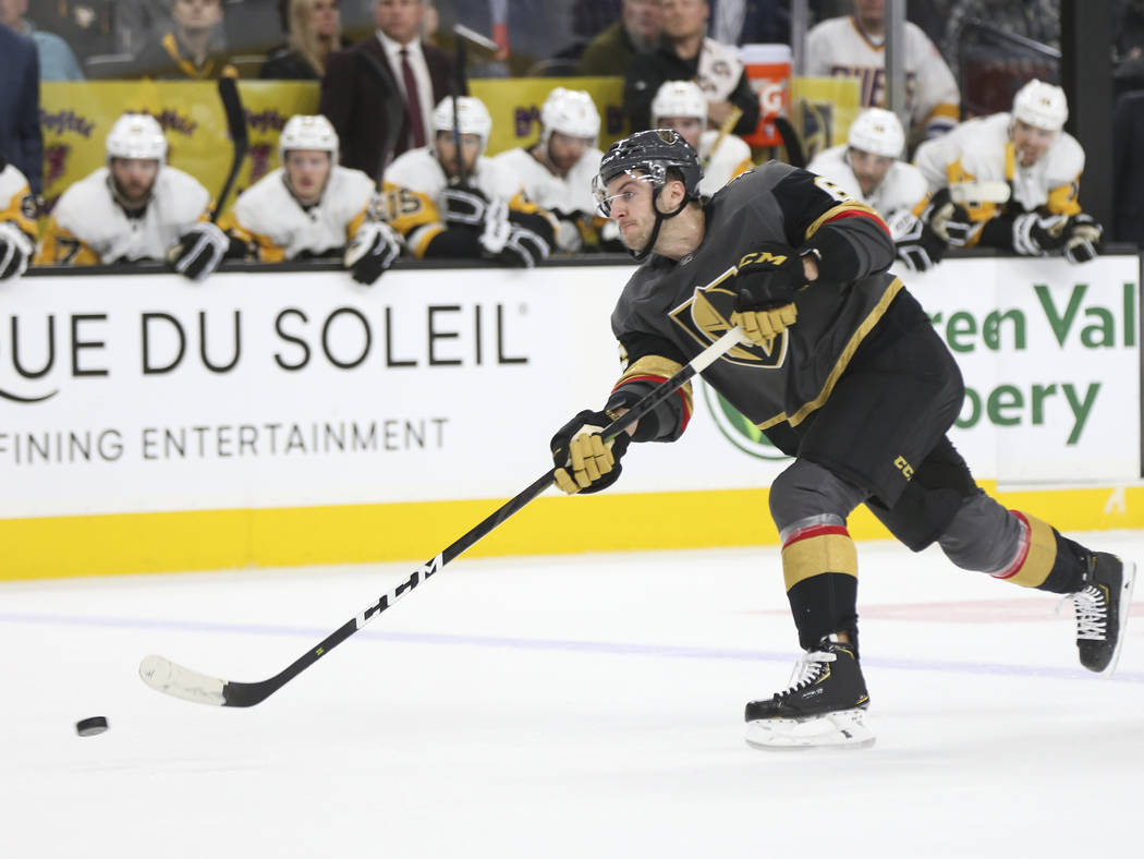 Golden Knights defenseman Colin Miller (6) shoots against the Pittsburgh Penguins during the first period of an NHL hockey game at T-Mobile Arena in Las Vegas on Saturday, Jan. 19, 2019. Chase Ste ...