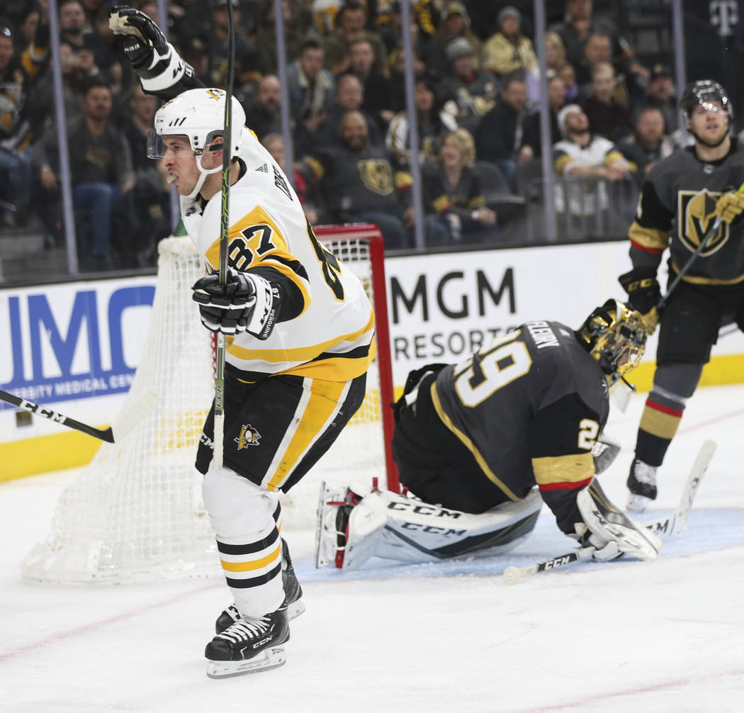 Pittsburgh Penguins center Sidney Crosby (87) celebrates his goal past Golden Knights goaltender Marc-Andre Fleury (29) during the second period of an NHL hockey game at T-Mobile Arena in Las Vega ...