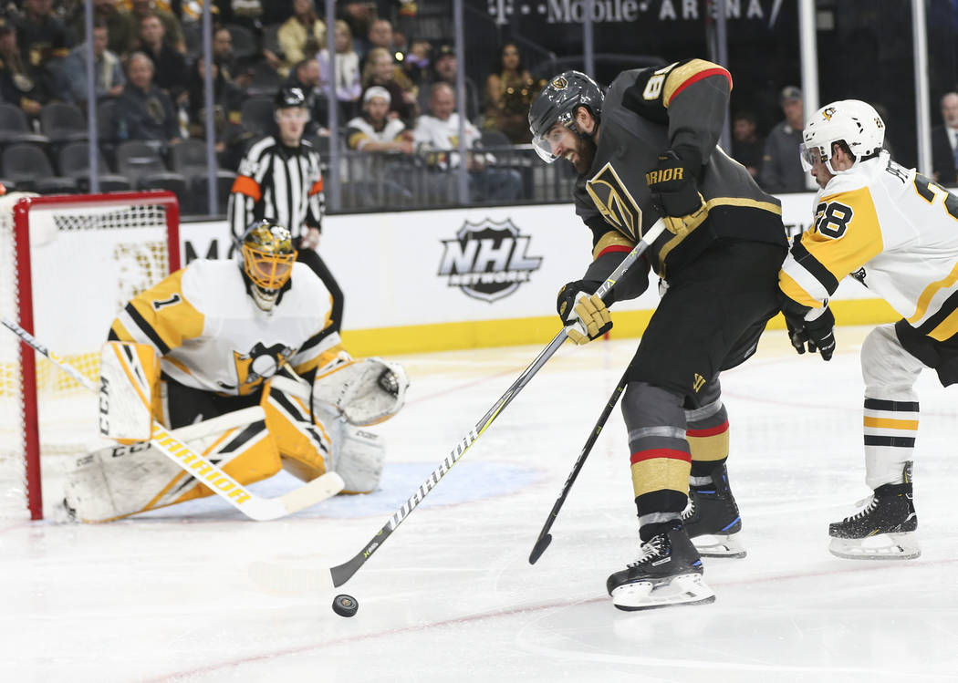 Golden Knights right wing Alex Tuch (89) looks to shoot against Pittsburgh Penguins goaltender Casey DeSmith (1) during the third period of an NHL hockey game at T-Mobile Arena in Las Vegas on Sat ...
