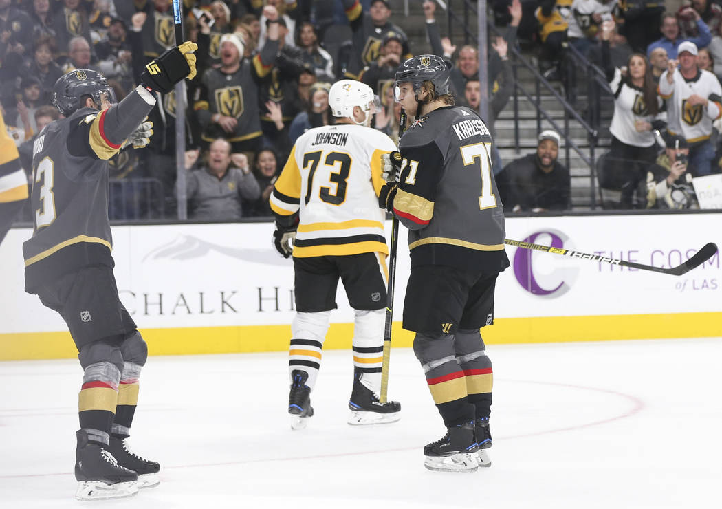 Golden Knights center Brandon Pirri, left, celebrates a goal by Golden Knights center William Karlsson (71) during the third period of an NHL hockey game against the Pittsburgh Penguins at T-Mobil ...