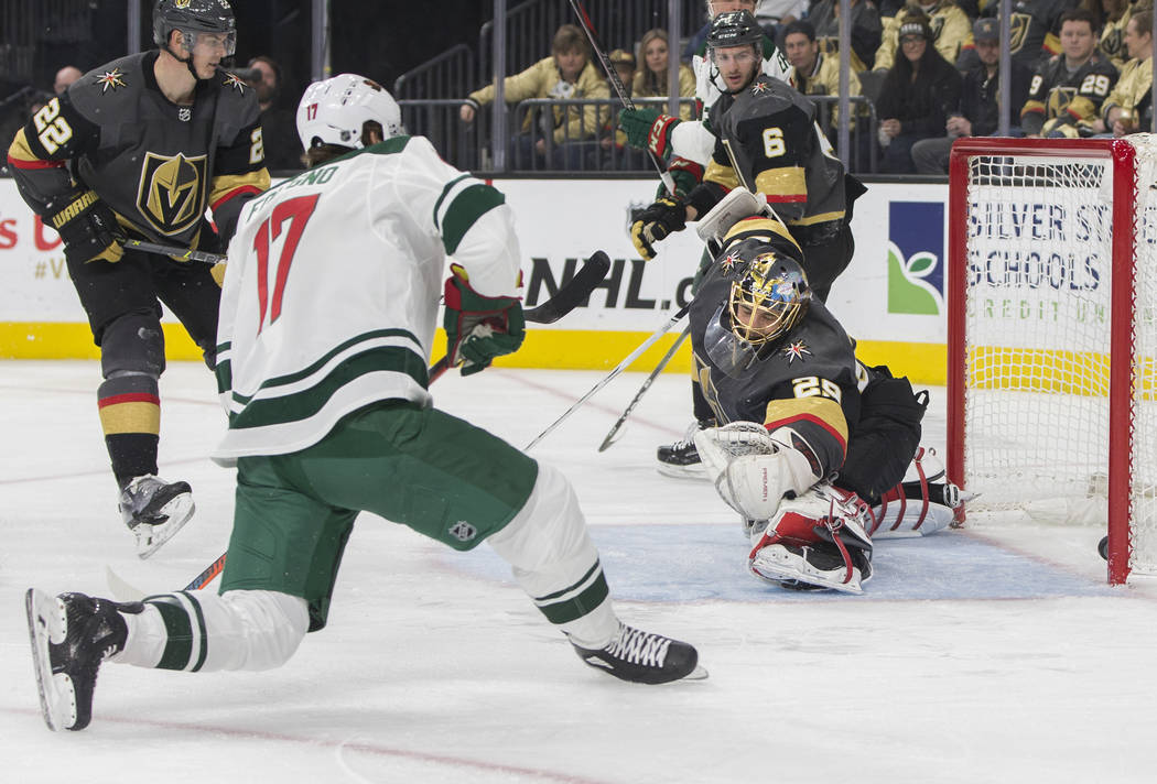 Minnesota Wild left wing Marcus Foligno (17) scores a goal against Golden Knights goaltender Marc-Andre Fleury (29) in the second period during their road matchup with Vegas on Monday, Jan. 21, 20 ...