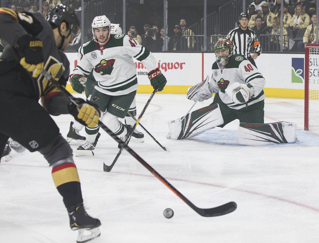 Golden Knights left wing Max Pacioretty (67) shoots against Minnesota Wild goaltender Devan Dubnyk (40) in the first period on Monday, Jan. 21, 2019, at T-Mobile Arena, in Las Vegas. (Benjamin Hag ...