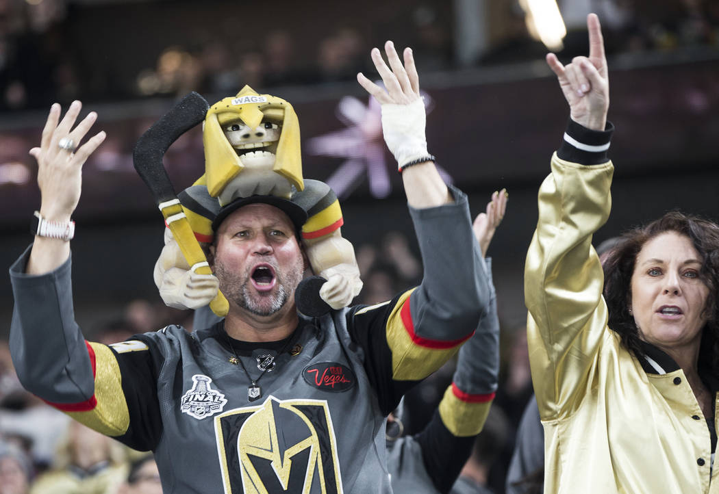 Golden Knights fans celebrate after Vegas scored a goal in the second period during their home matchup with the Minnesota Wild on Monday, Jan. 21, 2019, at T-Mobile Arena, in Las Vegas. (Benjamin ...