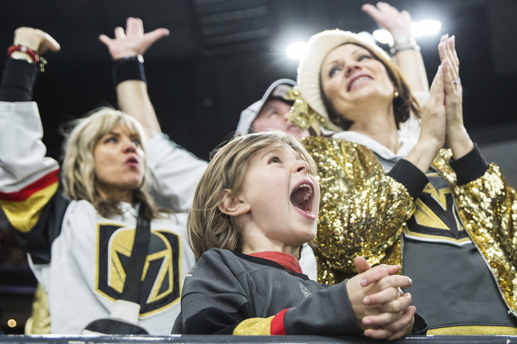 Golden Knights fan Mick Mugnier, 12, cheers for Vegas in the third period during their home matchup with the Minnesota Wild on Monday, Jan. 21, 2019, at T-Mobile Arena, in Las Vegas. (Benjamin Hag ...