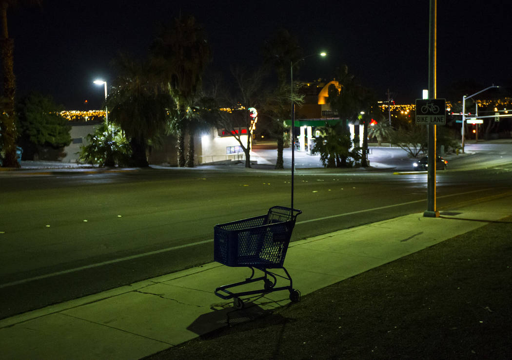 A lone shopping cart sits along Washington Avenue near Las Vegas Boulevard during the annual So ...