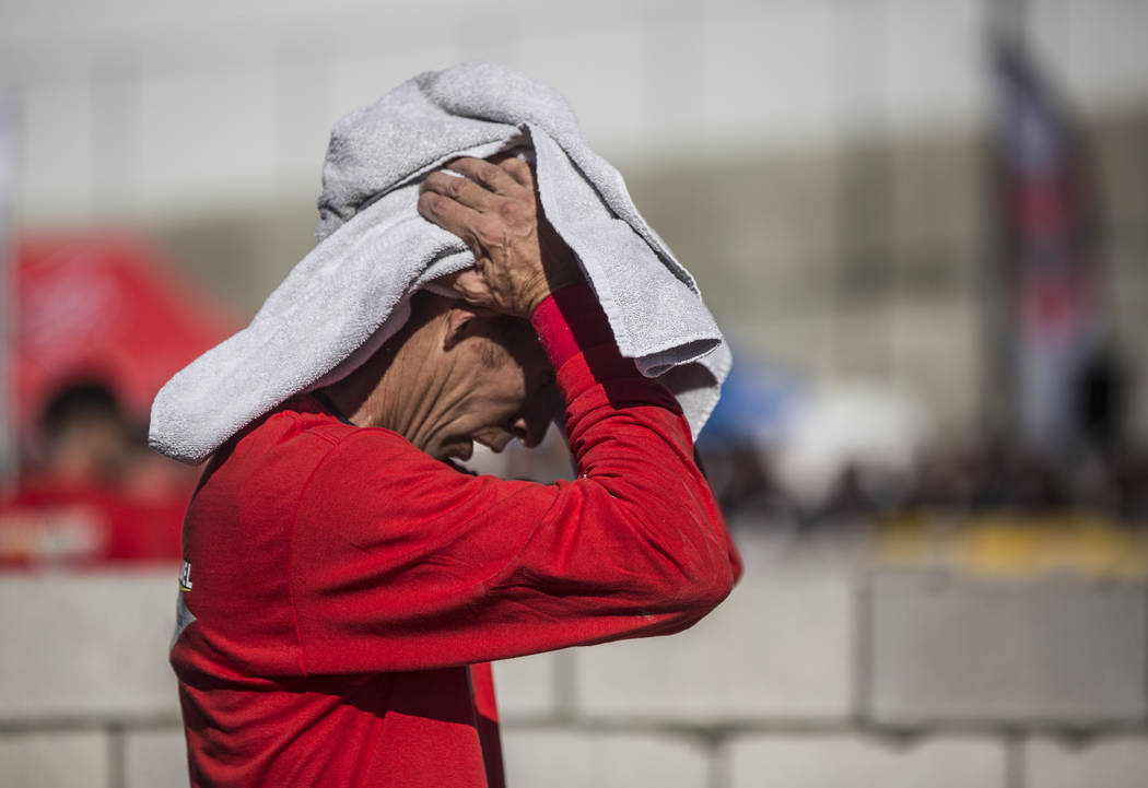 Chris Carlton cools off after finishing a masonry competition during day two of the World of Concrete trade show on Wednesday, Jan. 23, 2019, at the Las Vegas Convention Center, in Las Vegas. (Ben ...
