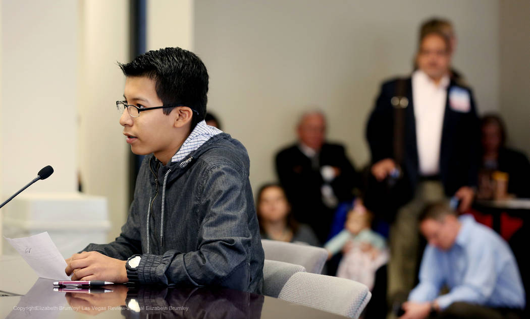 Erick Ruiz, a ninth grade student at Odyssey Charter High School, shares his opinion against transgender policies for the Clark County School District at Nevada Department of Education in Las Veg ...