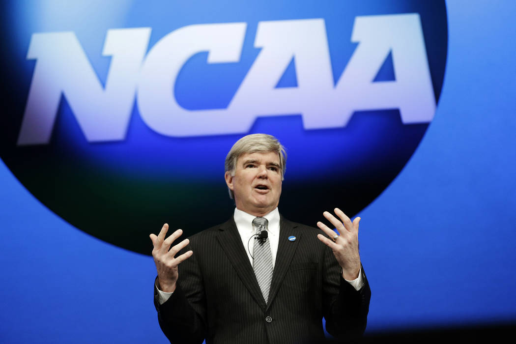 In this Jan. 17, 2013, file photo, NCAA President Mark Emmert speaks at the organization's annual convention in Grapevine, Texas. (AP Photo/LM Otero, File)