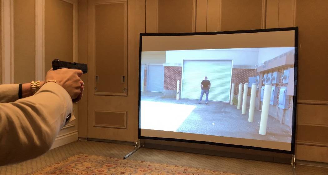 MEGGITT salesman Johnathan Ayala demonstrates the company's virtual training program at SHOT Show, Friday, Jan. 25, 2017. (Mick Akers/Las Vegas Review-Journal)