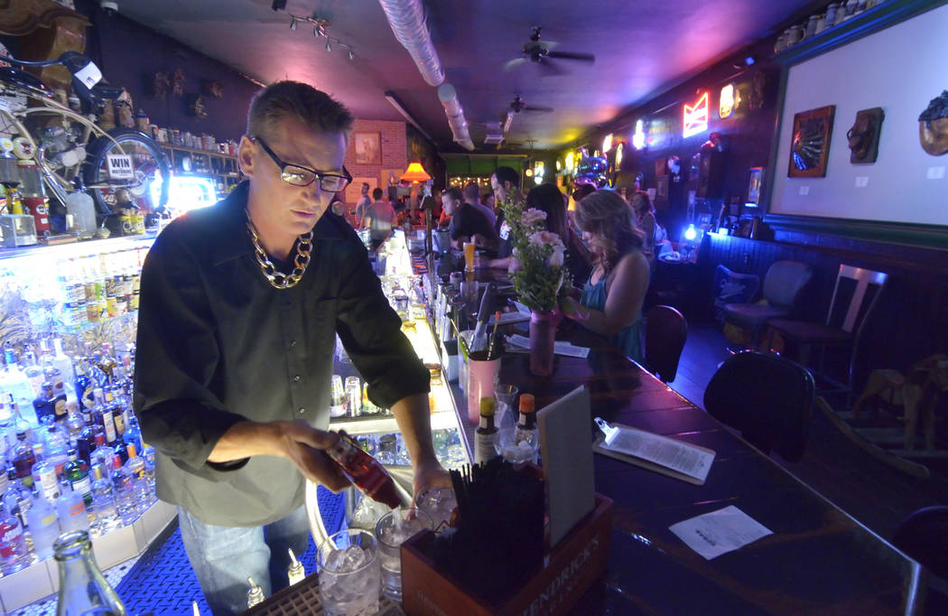 Co-owner Derek Stonebarger mixes drinks at Rebar at 1225 S. Main St. in Las Vegas Aug. 27. Bill Hughes/View
