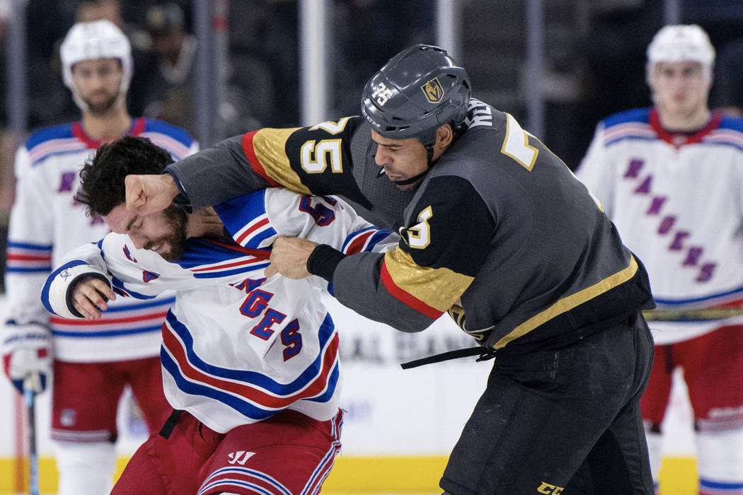 Rangers' Ryan Reaves brawls with Wild's Marcus Foligno, points to