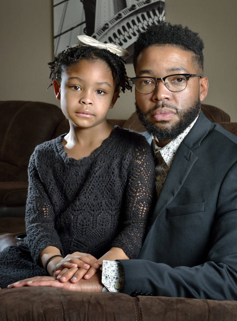 Brooklynn Murray, 7, is shown with her father Dwayne at their home in Las Vegas on Monday, Jan. 28, 2019. The Murrays won a $42 million settlement against Centennial Hills Hospital after a jury ru ...