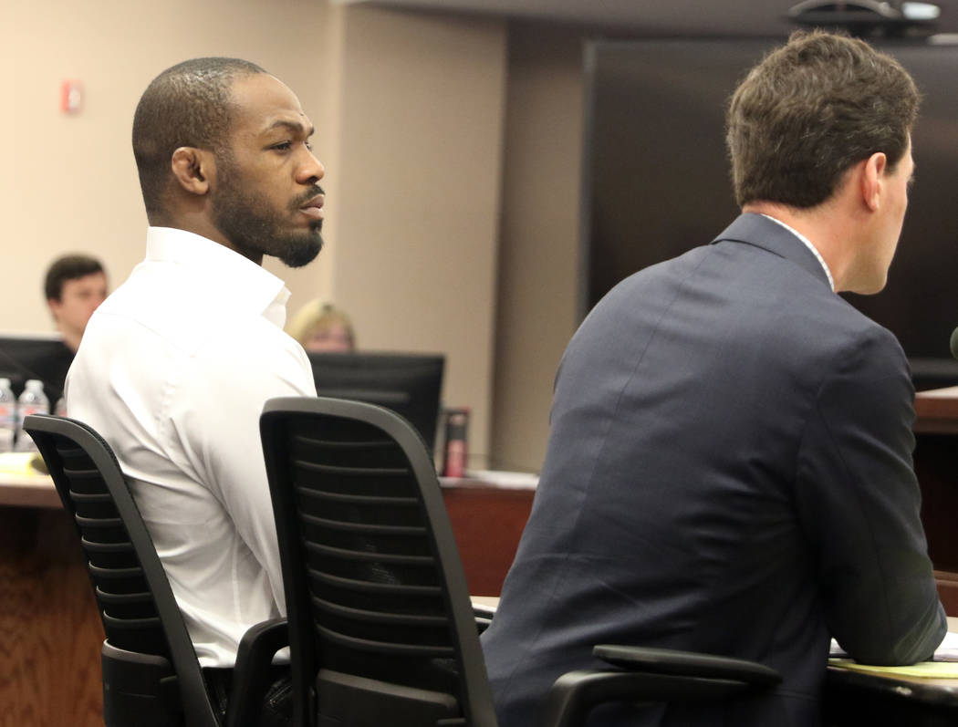 UFC light heavyweight champion Jon Jones, left, attends his licensing hearing before the Nevada Athletic Commission meeting in Las Vegas, Tuesday, Jan. 29, 2019. (Heidi Fang /Las Vegas Review-Jour ...