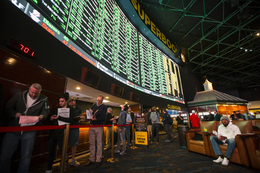 Bettors line up to place prop bets for the Super Bowl at the Westgate Superbook in Las Vegas on Thursday, Jan. 24, 2019. The sportsbook posted 442 two-way props and more than 1,000 betting options ...