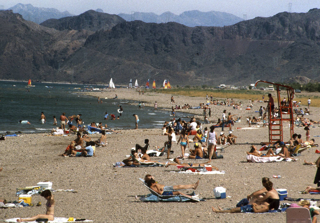 People hang out on Boulder Beach during Memorial Day weekend at Lake Mead National Recreation Area near Boulder City on May 24, 1987. (Gary Thompson/Las Vegas Review-Journal)