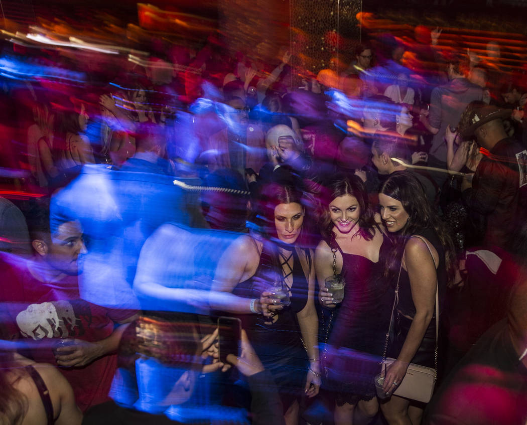 Club goers socialize at Tao Las Vegas on Thursday, Jan. 31, 2019, at The Grand Canal Shoppes, in Las Vegas. (Benjamin Hager/Las Vegas Review-Journal) @BenjaminHphoto