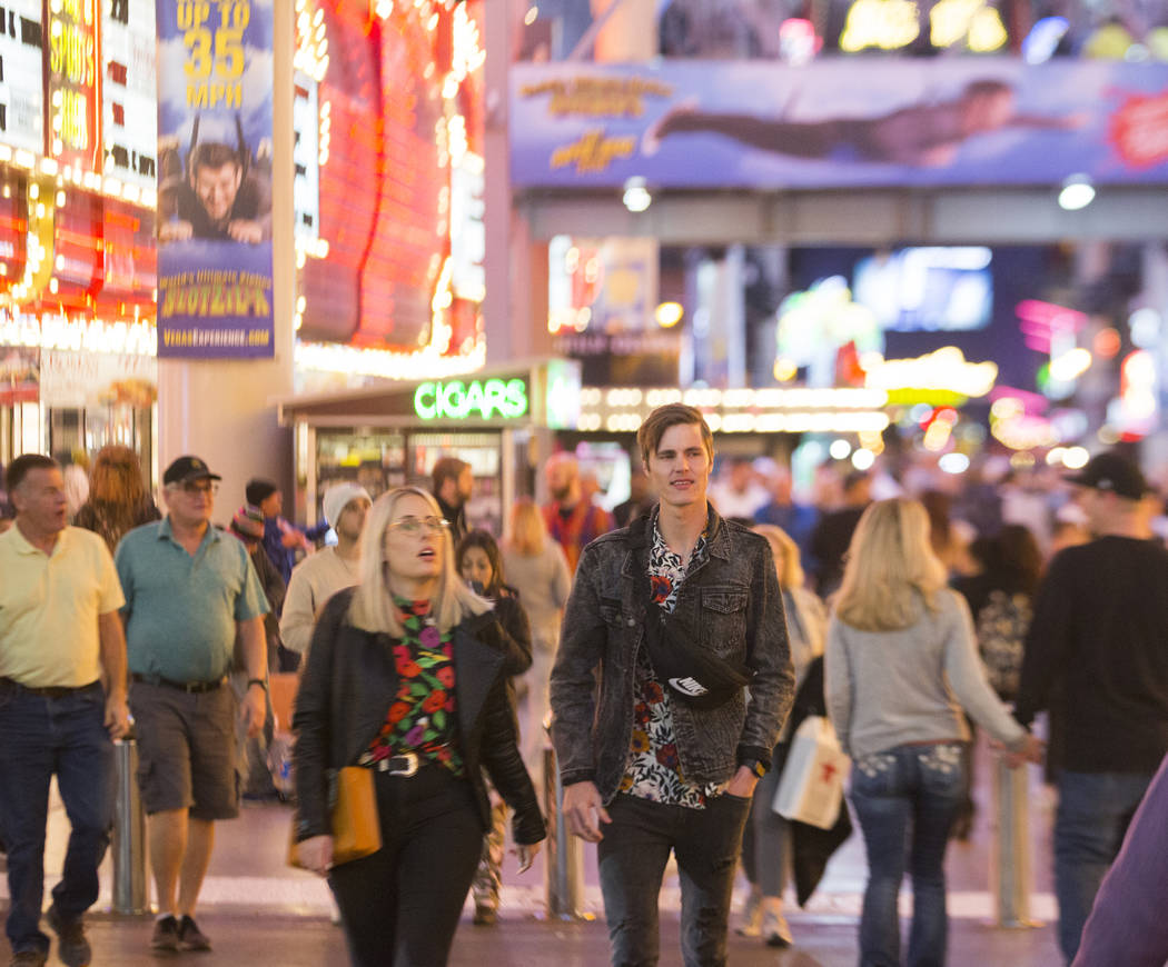 The Fremont Street Experience is packed on Wednesday, Jan. 30, 2019, in Las Vegas. (Benjamin Hager/Las Vegas Review-Journal) @BenjaminHphoto