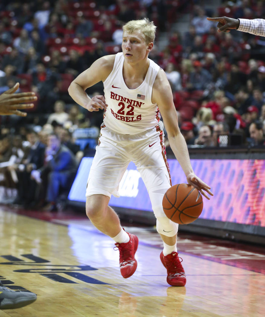 UNLV Rebels guard Trey Woodbury (22) moves the ball against Wyoming during the first half of a basketball game at the Thomas & Mack Center in Las Vegas on Saturday, Jan. 5, 2019. Chase Stevens Las ...