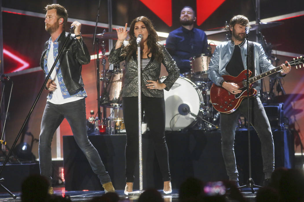 Lady Antebellum's Charles Kelley, Hillary Scott and Dave Haywood, from left, perform at the iHeartCountry Festival at the Frank Erwin Center on Saturday, May 6, 2017, in Austin, Texas. (Photo by J ...