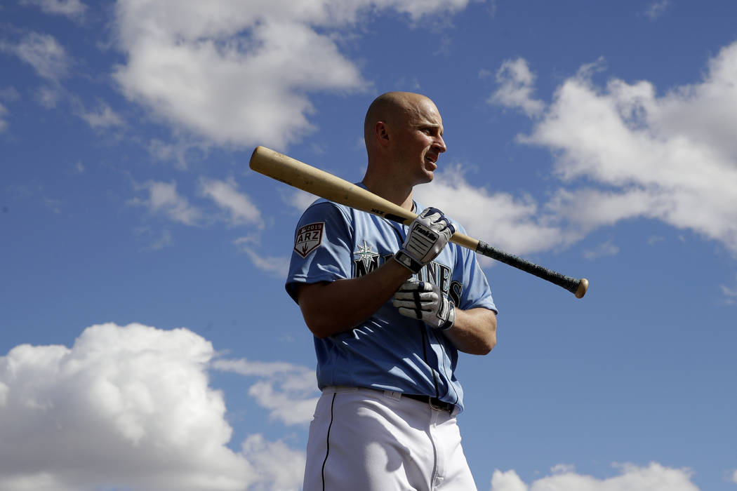 Seattle Mariners' Kyle Seager waits to bat during spring training baseball practice Saturday, Feb. 16, 2019, in Peoria, Ariz. (AP Photo/Charlie Riedel)