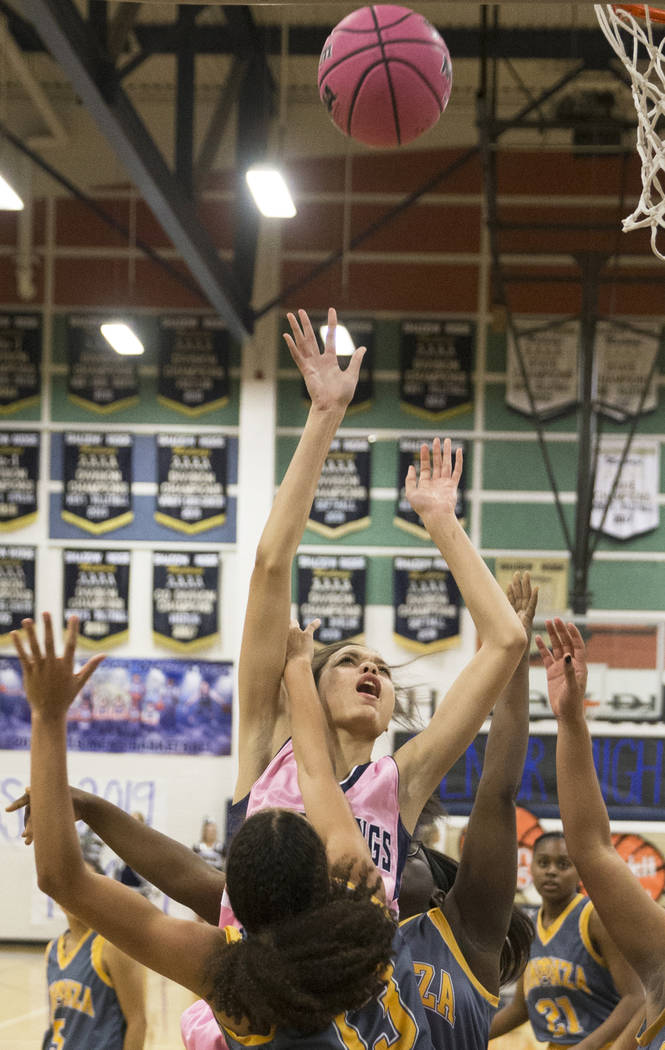 Shadow Ridge junior Christina Thames (32) shoots over Bonanza senior Macyn Raleigh (13) in the third quarter on Monday, Feb. 4, 2019, at Shadow Ridge High School, in Las Vegas. (Benjamin Hager/Las ...