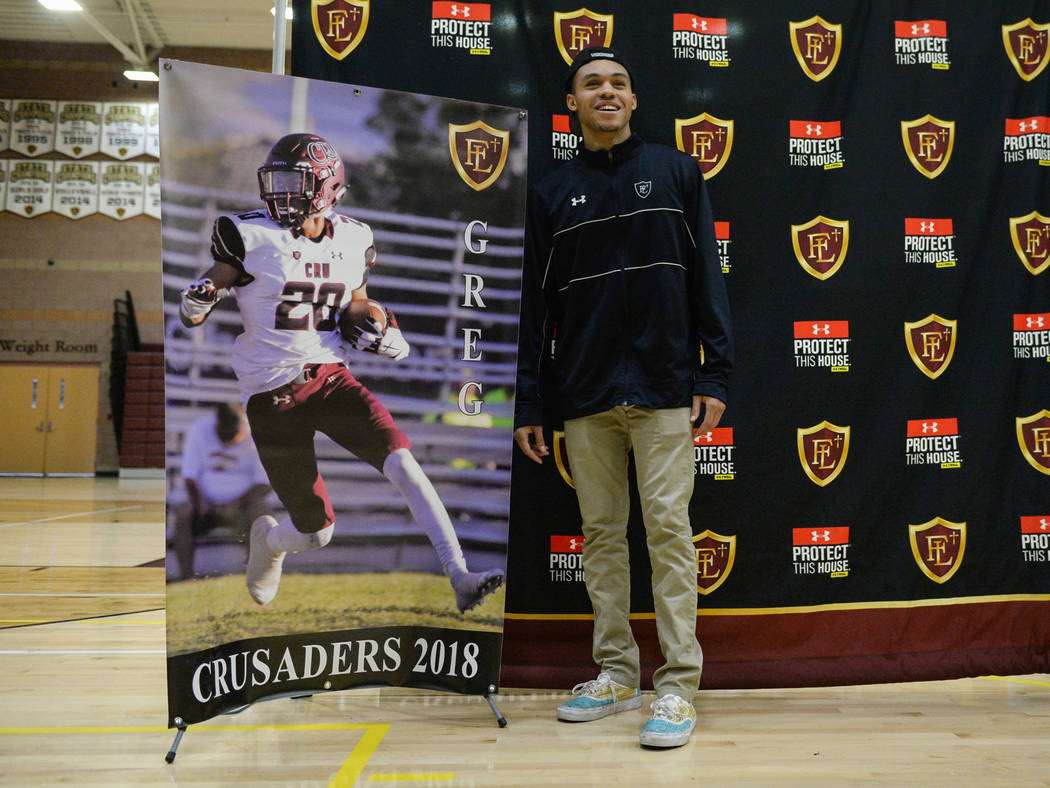 Faith Lutheran High School senior Greg Oliver poses after signing his national letter of intent to Portland State University at Faith Lutheran High School in Las Vegas, Wednesday, Feb. 6, 2019. Ca ...