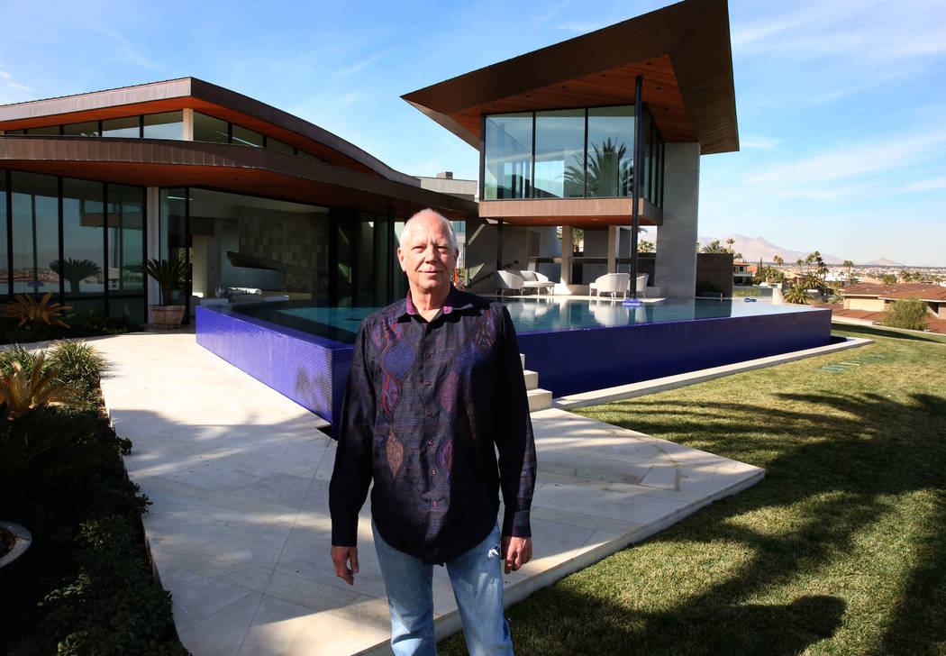 Jim Rhodes, a developer, poses for a photo at his mansion on Friday, Feb. 1, 2019, in Spanish Hills community in Las Vegas. Rhodes has listed his mansion for almost $30 million. (Bizuayehu Tesfaye ...