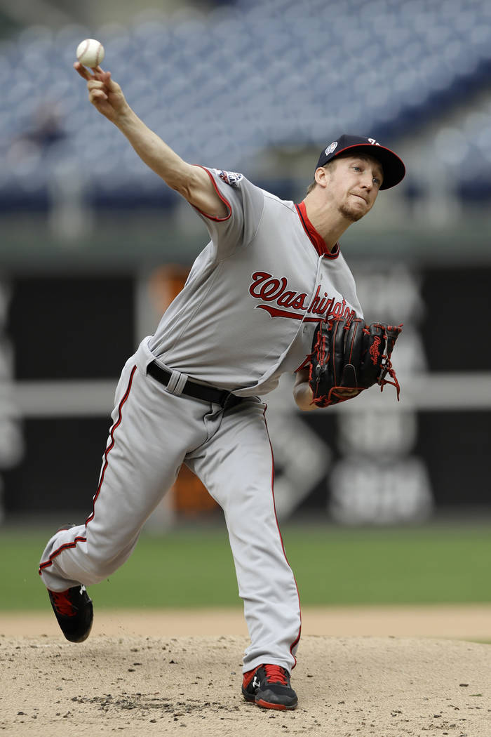 Washington Nationals' Erick Fedde pitches during the first inning of the first game of a baseball doubleheader against the Philadelphia Phillies, Tuesday, Sept. 11, 2018, in Philadelphia. (AP Phot ...