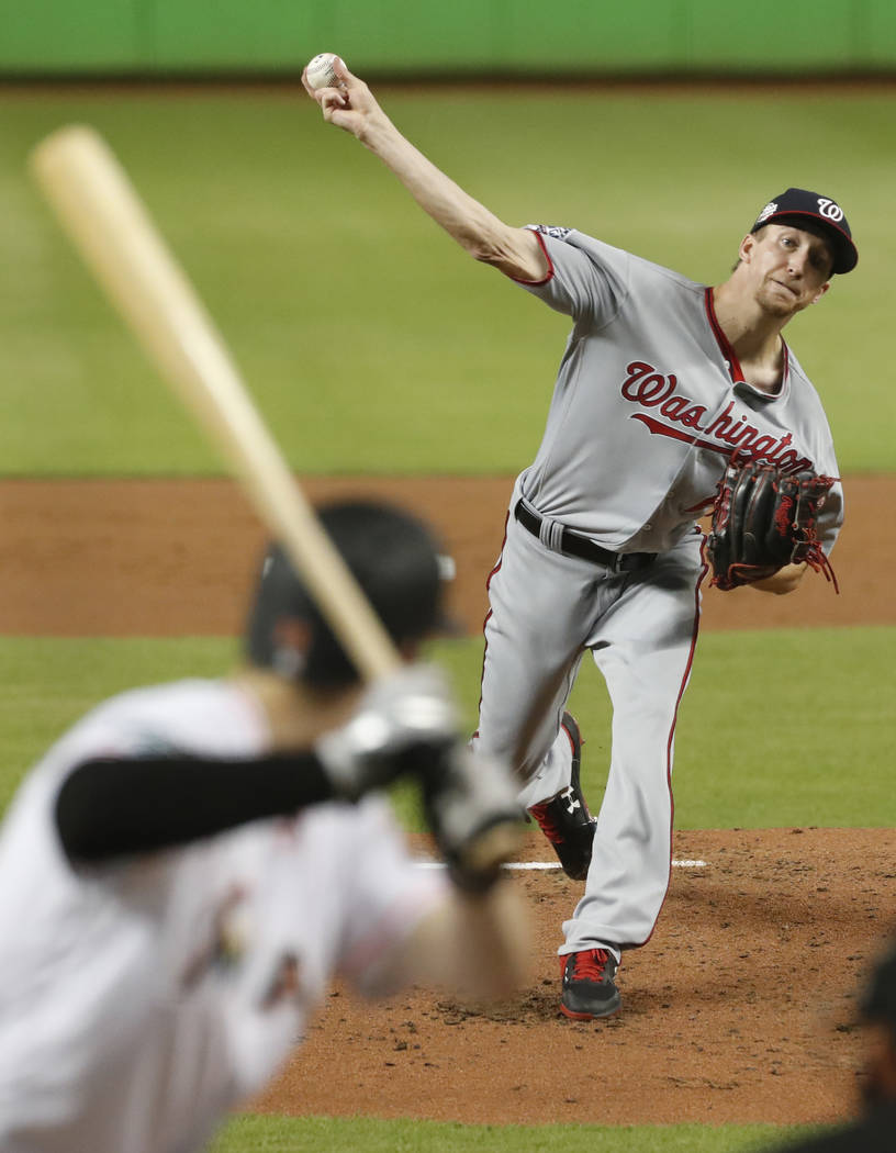 Washington Nationals' Erick Fedde pitches to Miami Marlins' Brian Anderson during the first inning of a baseball game, Monday, Sept. 17, 2018, in Miami. (AP Photo/Wilfredo Lee)