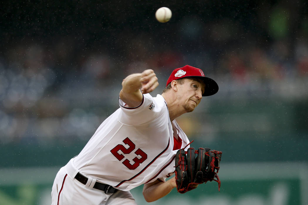 Washington Nationals pitcher Erick Fedde pitches in the first inning of a baseball game against the New York Mets at Nationals Park, Sunday, Sept. 23, 2018, in Washington. (AP Photo/Andrew Harnik)
