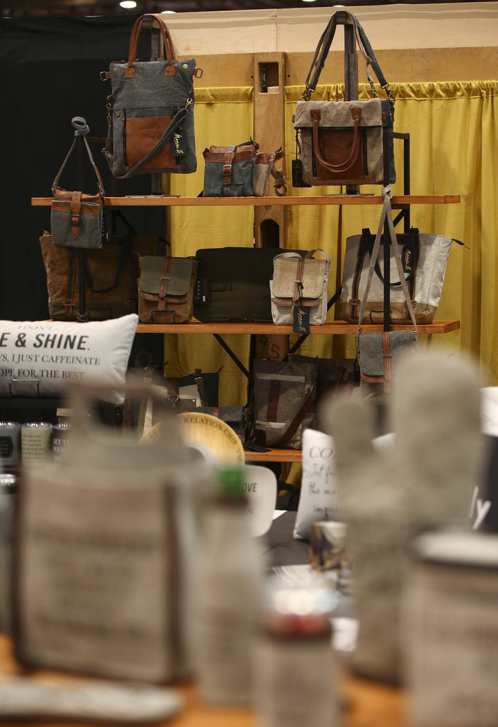A variety of items on display by sustainable lifestyle brand Mona B during WWDMAGIC, part of the MAGIC trade show, at the Las Vegas Convention Center in Las Vegas on Tuesday, Feb. 5, 2019. (Chase ...