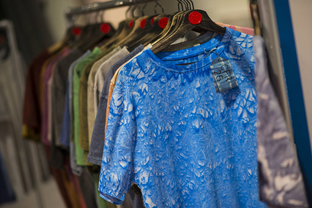 Shirts dyed with eco-friendly materials from Tintes Egara are displayed during the Sourcing at MAGIC trade show at the Las Vegas Convention Center in Las Vegas on Wednesday, Feb. 6, 2019. (Chase S ...