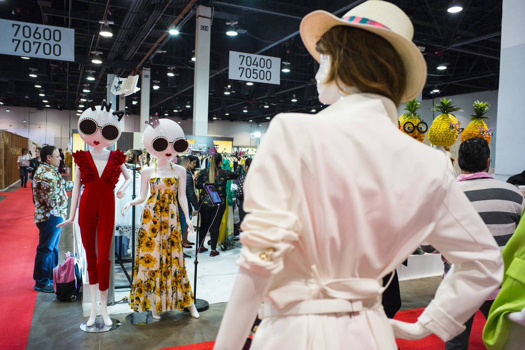 A view of colorfully clothed mannequins at the INA booth during the Sourcing at MAGIC trade show at the Las Vegas Convention Center in Las Vegas on Wednesday, Feb. 6, 2019. (Chase Stevens/Las Vega ...