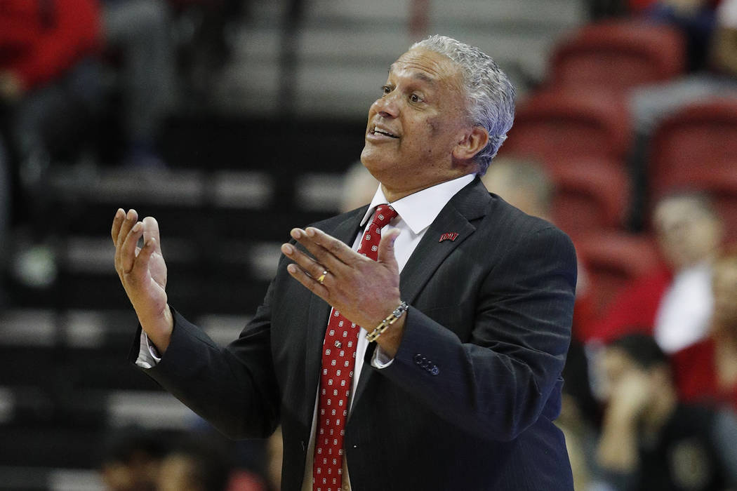 UNLV head coach Marvin Menzies coaches against Nevada during the second half of an NCAA college basketball game Tuesday, Jan. 29, 2019, in Las Vegas. Nevada won 87-70. (AP Photo/John Locher)