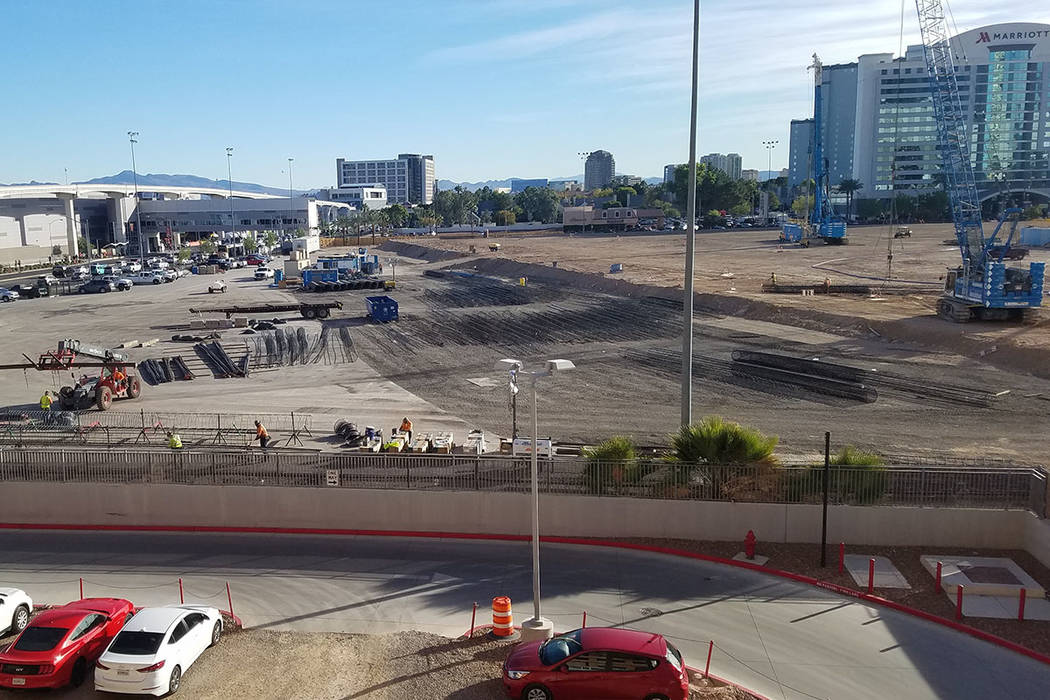 Crews work on the foundation of the Las Vegas Convention and Visitors Authority's $935.1 million convention center expansion on Wednesday, Oct. 31, 2018, on the north end of the construction site, ...