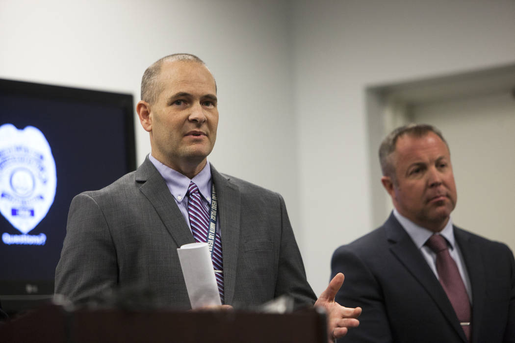 Detective Steven Wiese answers a question from the media next to Detective Sean Sprague at the North Las Vegas Detective Bureau in North Las Vegas, Monday, Feb. 11, 2019. Officials gathered to dis ...