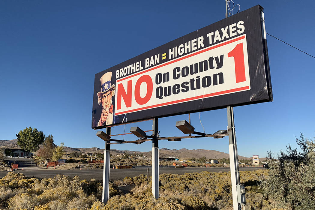 A sign outside the Bunny Ranch restaurant in Mound House, Lyon County, urges people to vote against banning legal prostitution in the county. (Bill Dentzer/Las Vegas Review-Journal)