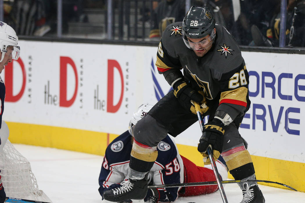 Vegas Golden Knights left wing William Carrier (28) rounds the Columbus Blue Jackets' goal with the puck during the third period of an NHL hockey game at T-Mobile Arena in Las Vegas, Saturday, Feb ...