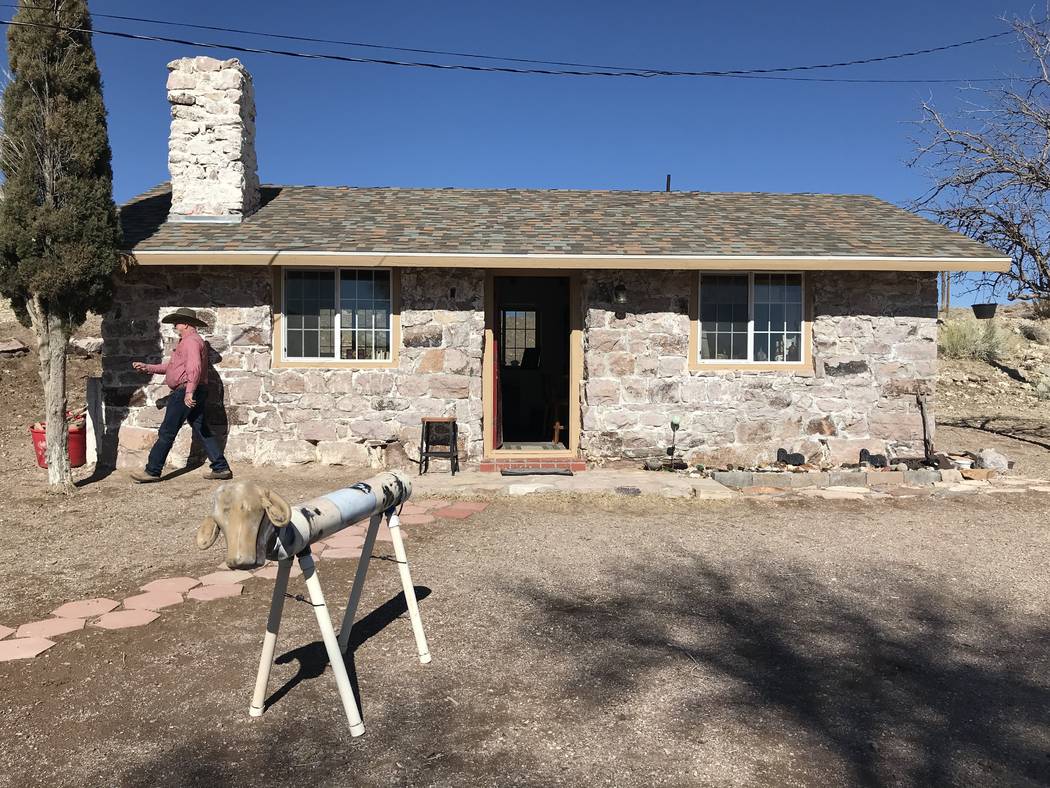 Rancher Hank Brackenbury walks in front of an old stone house at the 7J Ranch northeast of Beatty on Feb. 8, 2019. Henry Brean Las Vegas Review-Journal