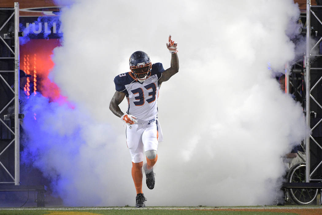 Orlando Apollos safety Will Hill III runs onto the field during player introductions for the team's Alliance of American Football game against the Atlanta Legends on Saturday, Feb. 9, 2019, in Orl ...