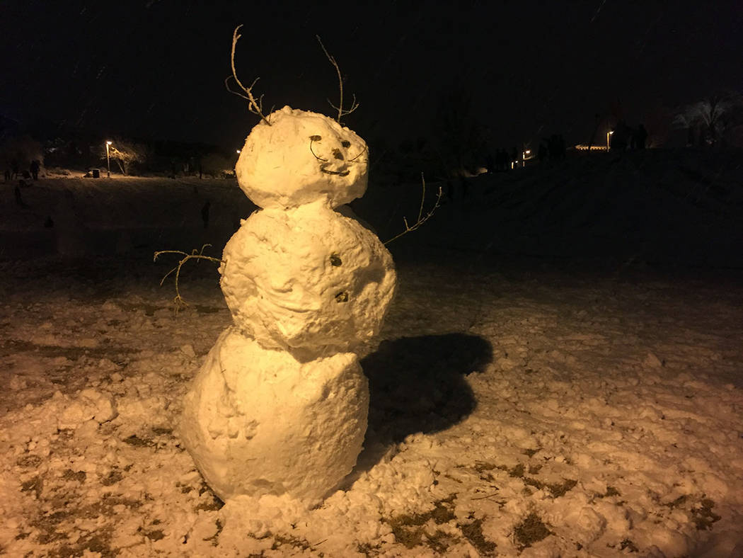 A snowman is seen Sunday night, Feb.17, 2019, at Fox Hill Park in Summerlin. (Marian Green/Las Vegas Review-Journal)