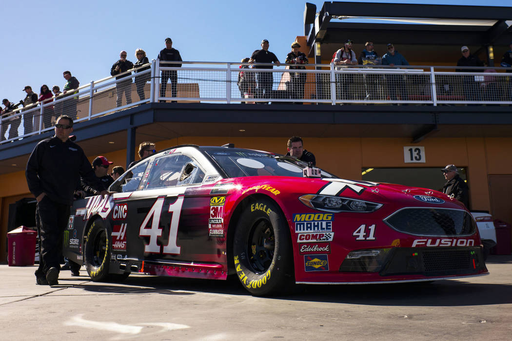 The car of driver Kurt Busch (41) goes through inspections before the Monster Energy NASCAR Cup Series Pennzoil 400 auto race at the Las Vegas Motor Speedway in Las Vegas on Sunday, March 4, 2018. ...