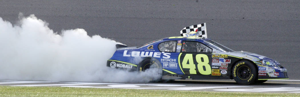 Jimmie Johnson burns out after winning the NASCAR Nextel Cup Series UAW-DaimlerCrystler 400 at Las Vegas Motor Speedway in Las Vegas Sunday, March 12, 2006. Johnson won the race for the second yea ...
