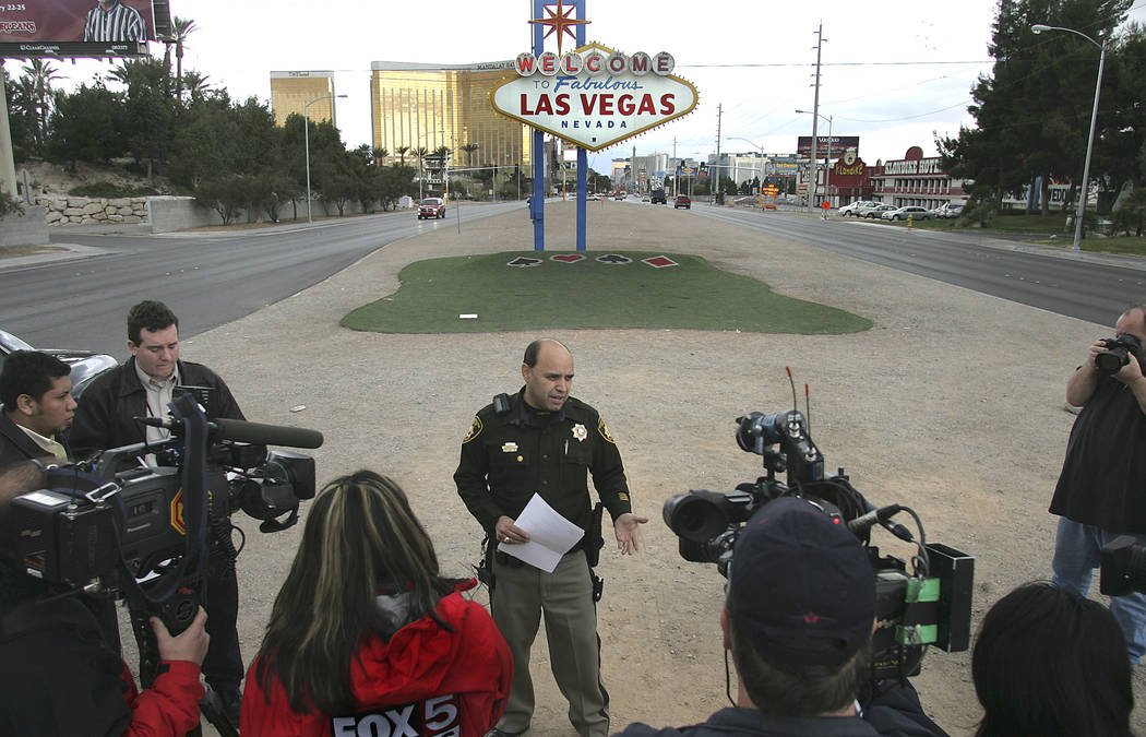 Las Vegas police public information officer Jose Montoya speaks during a news conference in the median on Las Vegas Boulevard near the Welcome to Fabulous Las Vegas Sign Monday, Feb. 19, 2007. Mon ...