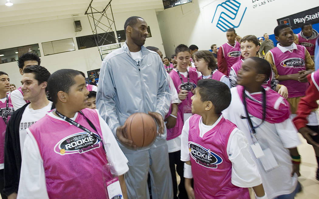 Los Angeles Lakers All-Star Kobe Bryant is surrounded by Lied Memorial Boys & Girls Club fans in Las Vegas on Friday, Feb. 16, 2007. Clint Karlsen/Las Vegas Review-Journal)