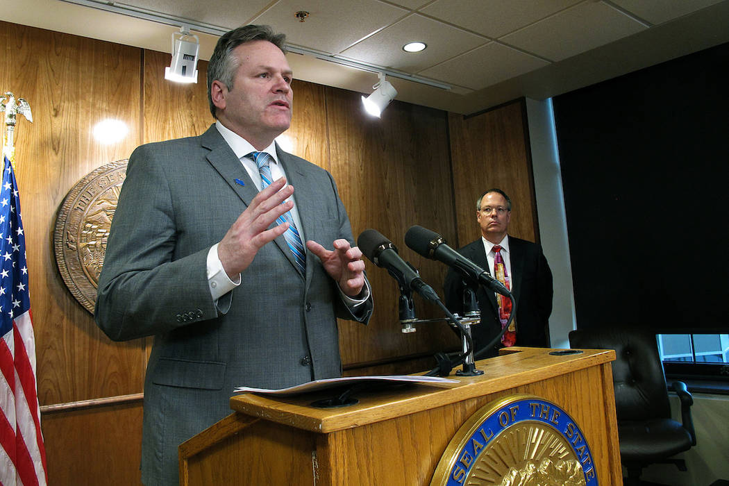 In this Jan. 16, 2019, file photo, Alaska Gov. Mike Dunleavy speaks at a news conference in Juneau, Alaska. (AP Photo/Becky Bohrer, file)