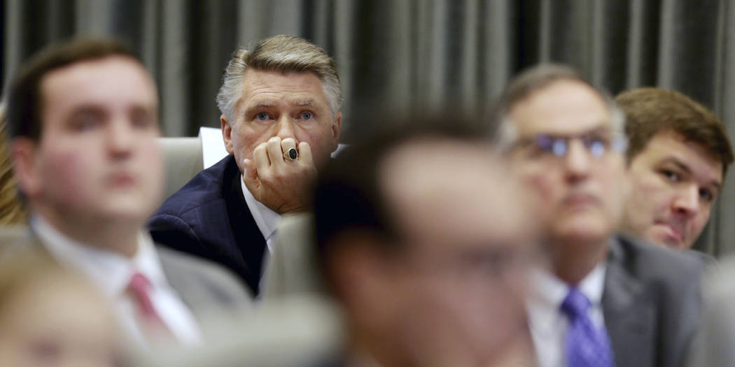 Mark Harris listens to the public evidentiary hearing on the 9th Congressional District investigation Monday, Feb. 18, 2019, at the North Carolina State Bar in Raleigh, N.C. (Juli Leonard/The News ...