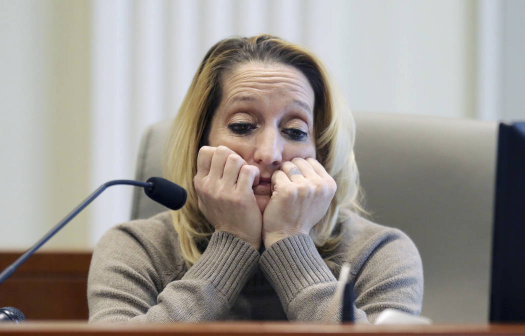 Lisa Britt pauses before answering a question during the public evidentiary hearing on the 9th Congressional District investigation at the North Carolina State Bar Monday, Feb. 18, 2019, in Raleig ...